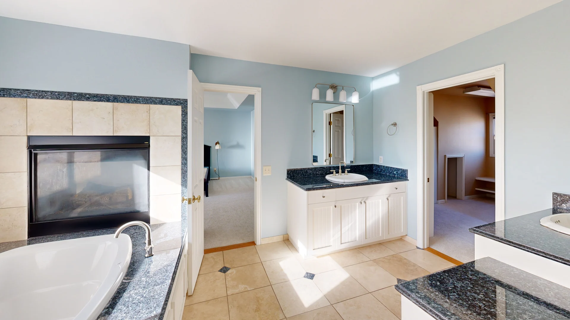 3D scan of a master bathroom with fireplace and soaking tub